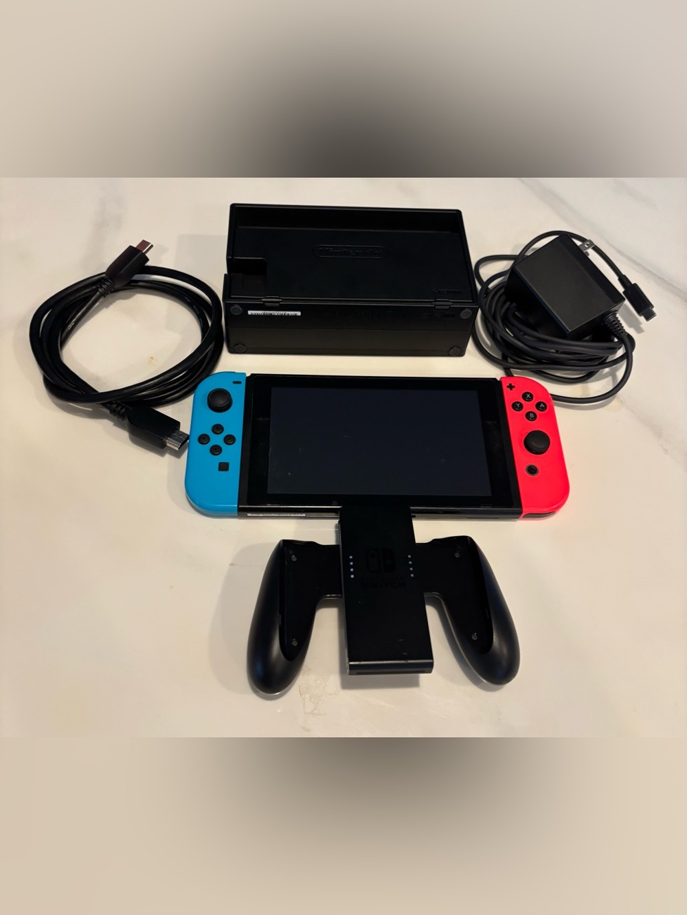 Nintendo Switch Console
Bundle (Neon Blue / Neon Red)
Console Bundle Red & Black